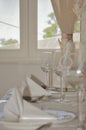 Wooden table and chair in vintage dinning room at home. Interior.  Table prepared for party or formal celebration or wedding Royalty Free Stock Photo