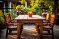 Wooden table chairs backyard sunset. Generate Ai Royalty Free Stock Photo