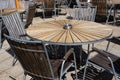 Wooden table and chairs in beach cafe. Royalty Free Stock Photo