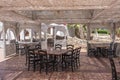 Wooden table and chairs in beach cafe next to the red sea in Sharm el Sheikh, Egypt Royalty Free Stock Photo