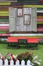 Wooden table and chairs in garden Royalty Free Stock Photo