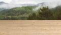 Wooden Table Closeup With Blurred Mountains