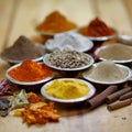 Wooden table of colorful spices