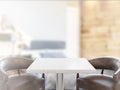 Table on defocuced interior background. 3D rendering