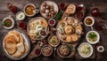 Wooden table with dishes of russian cuisine - borscht, pelmeni, herring, marinated mushrooms