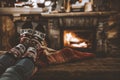 Wooden table with empty space for products and decorations. Blurred fireplace interior background. Royalty Free Stock Photo