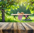 Wooden Table With Picnic Table in Background. Generative AI Royalty Free Stock Photo
