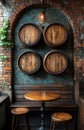 A wooden table with four stools and four barrels on the wall Royalty Free Stock Photo