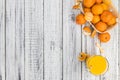 Wooden table with fresh made Tangerine Juice close-up shot Royalty Free Stock Photo