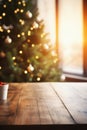 Wooden table in front of blurred christmas tree with bokeh lights Royalty Free Stock Photo