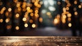 Wooden table in front of blurred christmas tree with bokeh lights Royalty Free Stock Photo