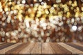 Wooden table on front blurred colorful bokeh background, abstract Royalty Free Stock Photo