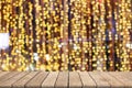Wooden table on front blurred colorful bokeh background, abstract, used for presentation and template Royalty Free Stock Photo
