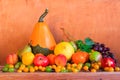 Wooden table full fresh fruit baskets Royalty Free Stock Photo