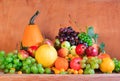 Wooden table full fresh fruit baskets Royalty Free Stock Photo