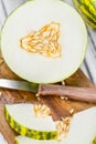 Wooden table with Futuro Melons selective focus Royalty Free Stock Photo