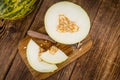 Wooden table with Futuro Melons selective focus Royalty Free Stock Photo