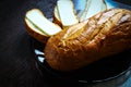 On wooden table glass plate with fresh fragrant white bread and cheese sandwiches Royalty Free Stock Photo