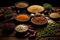 Wooden table graced with different beans and seeds in presentation