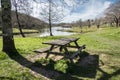 The wooden table by the lake