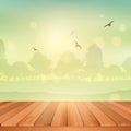 Wooden table looking out to sunny landscape Royalty Free Stock Photo