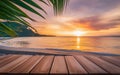 Wooden table over blur tropical beach background with sunset, product display montage. High quality photo Royalty Free Stock Photo