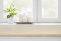 Wooden table over blurred window sill background for product display Royalty Free Stock Photo