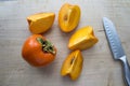 Fresh persimmon on a wooden table