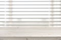 Wooden table from planks on window with venetian blinds background Royalty Free Stock Photo