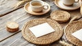 A wooden table with a plate of bread and a white card on it Royalty Free Stock Photo