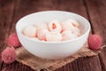 Wooden table with Preserved Lychees & x28;selective focus& x29;