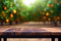 Wooden table for product and merchandise display and orange trees in the background. Generative AI