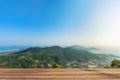 Wooden table with phuket town and island background Royalty Free Stock Photo