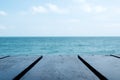 Wooden table with the sea and sky background Royalty Free Stock Photo