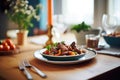 a wooden table set with beef bourguignon for dinner Royalty Free Stock Photo