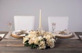 Wooden table setting and decoration for meal time, studio shot