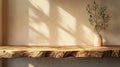 A wooden table with a shadow on the wall Royalty Free Stock Photo