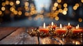 A wooden table with small candles and decorative Christmas stars with a defocused background of outdoor lights