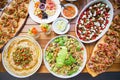 wooden table on the street in a cafe with food, Outdoor terrace concept of a buffet table, catering. Royalty Free Stock Photo