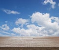 Wooden table top on blue sky with cloud Royalty Free Stock Photo