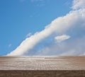 Wooden table top on blue sky with cloud Royalty Free Stock Photo