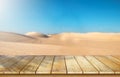 Wooden table top on blur desert background.Hot weather and drink somethings for fresh.Juice and cold water.For montage product