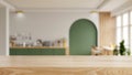 Wooden table top on blur kitchen room background,Modern Contemporary kitchen room interior Royalty Free Stock Photo