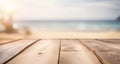 Wooden table top on blur tropical beach background. Royalty Free Stock Photo