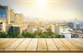 Wooden table top on blur Urban city landscape background.For montage product display or design key visual layout.View of copy Royalty Free Stock Photo