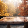 Wooden table top on blurred autumn background - can be used for display or montage your products