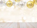 Wooden table top over set of disco glitter balls for christmas or new year ornament holidays Royalty Free Stock Photo