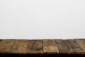 Wooden table top from rustic old wood planks with neutral gray wall Royalty Free Stock Photo