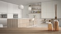 Wooden table top or shelf with aromatic sticks bottles over blurred contemporary modern wooden kitchen with shelves and cabinets