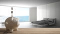 Wooden table top or shelf with white piggy bank with coins, minimalist bedroom with panoramic window, expensive home interior